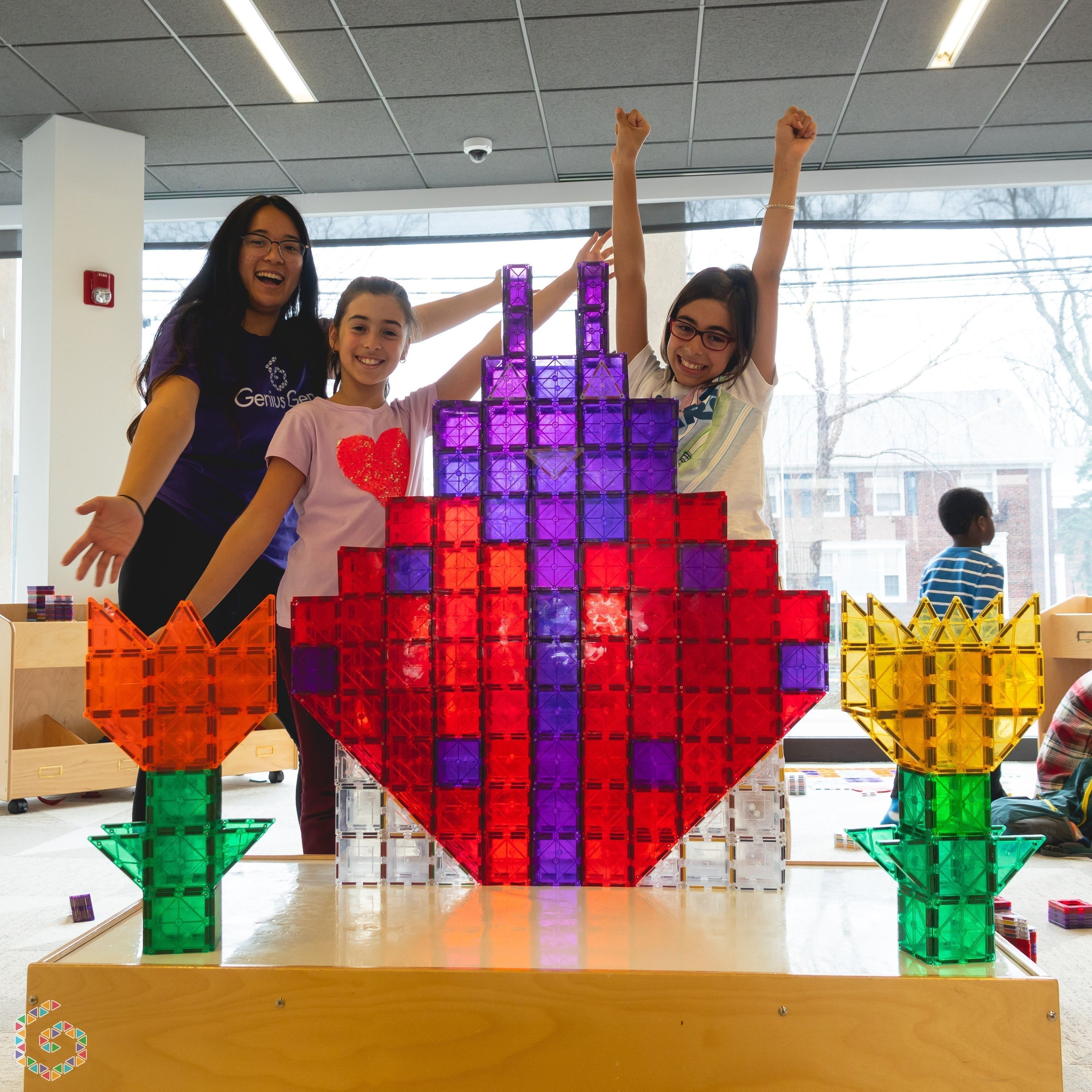 A giant magnetic-tile heart build at Genius Gems Millburn