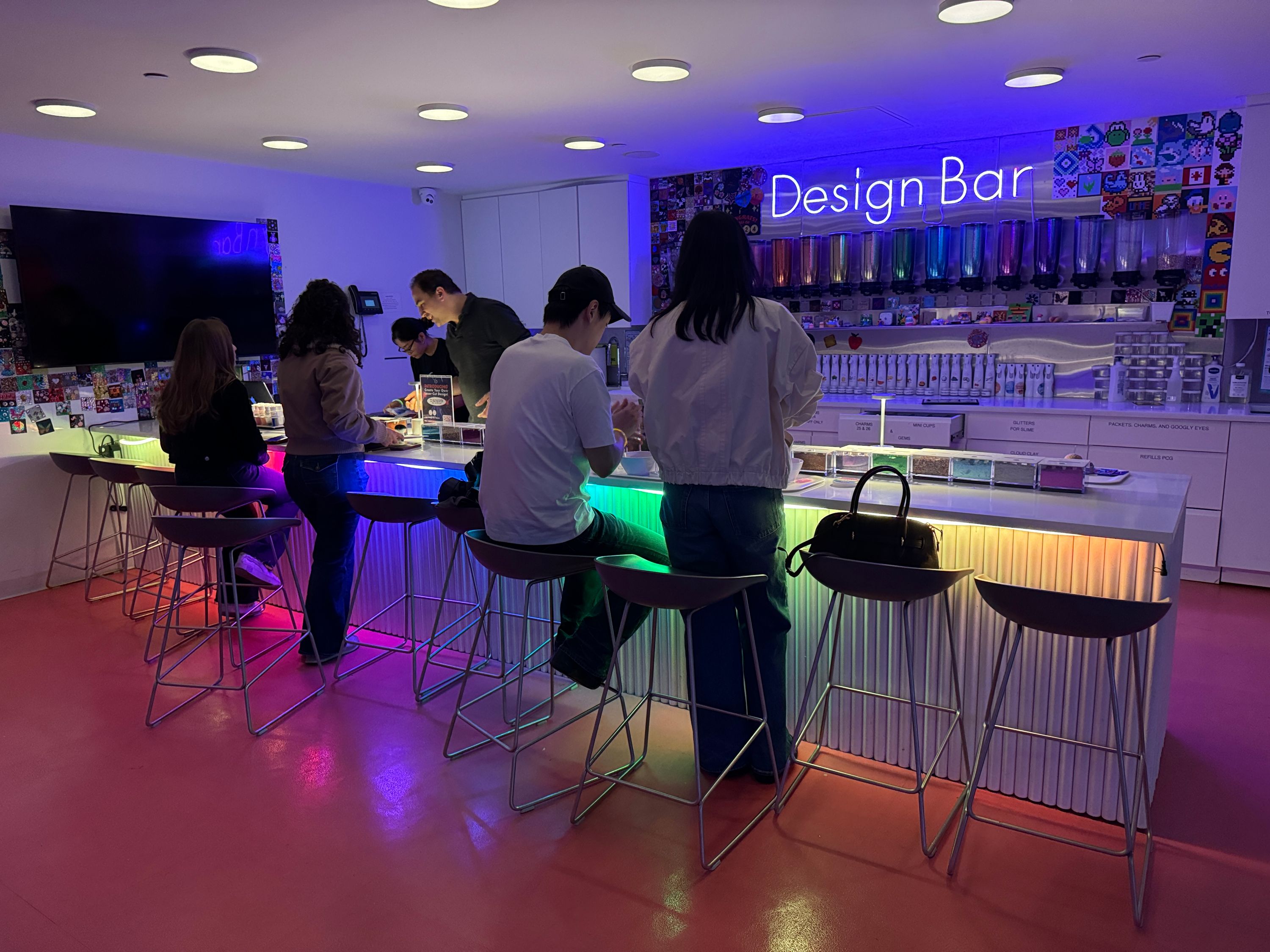 Adults at the Design Bar on an After Dark night at Genius Gems NYC