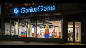 Genius Gems NYC at night